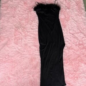 Chic Black Dress with Feather Detail and High Slit